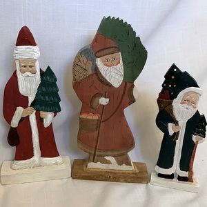 Get a jump on decor for next Christmas!.. Set of 3Folk Art Santa Clause figures!